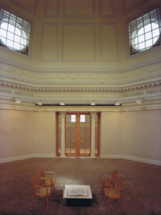 After the renovation, the small entrances were sealed, and larger entrances were added to the east and west sides. This moved the entrances away from classroom entrances to reduce distractions to other students. Additionally, the dome was opened up, allowing light from four large windows to illuminate the rotunda.