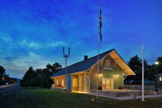 The Landrum Railroad Depot community room with the original freight doors on display.