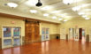 Thumbnail of The Landrum Railroad Depot community room with the original freight doors on display. Click to view larger image.