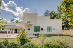 A view of the Polk County Early College addition from Highway 108 illustrates the stepped facade and window pattern.