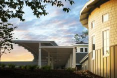 View from the forest with canopy and chapel on the right.