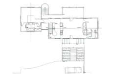 An architectural floor plan of the main level of this residence showing the master bedroom, study, kitchen, dining area, living room, and a second bedroom.